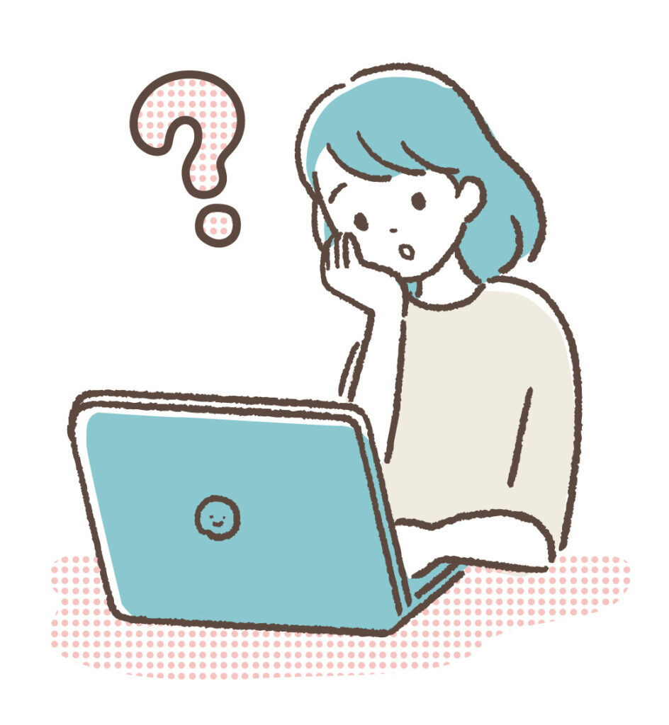 パソコンを見ながら悩む女性